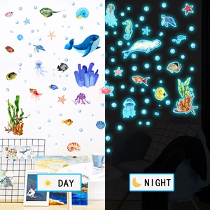 Luminous ocean animal wall stickers showing day and night blue glow effect for kids room