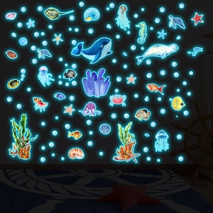 Glow-in-the-dark blue marine life wall stickers featuring whale and sea turtle for kids room