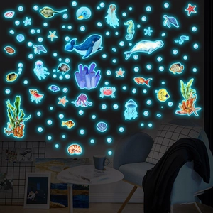 Glow-in-the-dark blue ocean marine animal wall stickers including whale and jellyfish