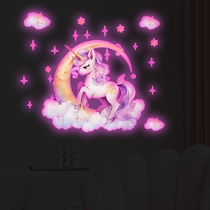 Glow-in-the-dark pink unicorn wall stickers with stars and clouds for kids' room
