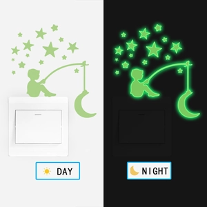 Glow in the dark wall stickers showing day and night contrast with moon and star patterns