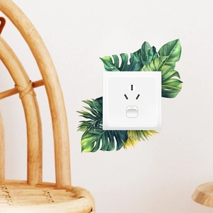 Tropical monstera leaf wall sticker for home switch panel decor in a cozy room