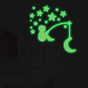 Glow-in-the-dark wall sticker featuring a boy fishing on the moon with stars