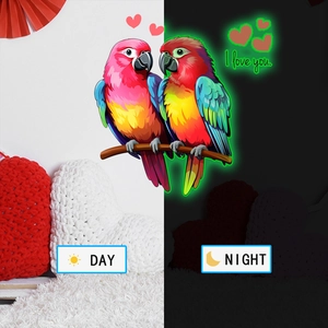 Luminous parrot wall stickers showing glowing green effect in dark and colorful daylight view