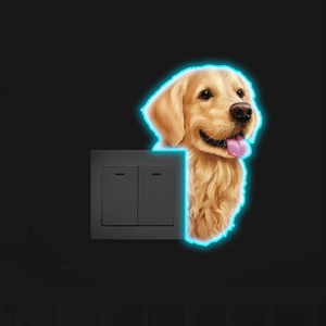 Luminous Golden Retriever wall sticker glowing next to a light switch in the dark