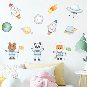 Nursery wall stickers featuring cute hand-drawn animals in space with colorful planets