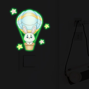 Sticker mural phosphorescent d'un lapin mignon en montgolfière avec étoiles lumineuses
