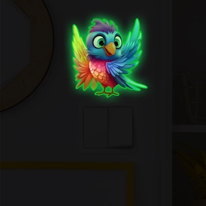 Luminous parrot wall sticker showing vivid green glow in the dark for home decoration