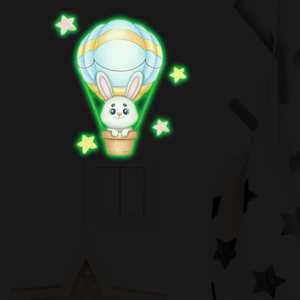 Stickers muraux fluorescents avec un lapin mignon en montgolfière et des étoiles brillantes