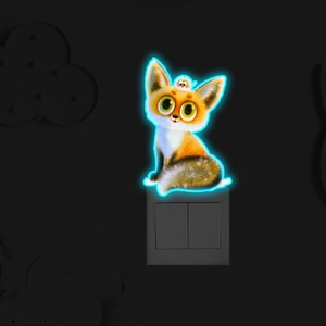 Sticker mural renard lumineux avec éclat fluorescent bleu près de l'interrupteur