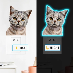 Luminous gray cat wall sticker showing decorative day and night blue glow effect details