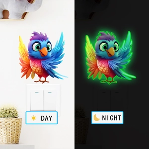 Luminous parrot wall sticker showing vivid colors in day and green glow at night