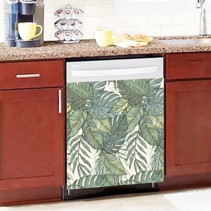 Macro detail of tropical monstera palm leaf decal on a modern kitchen dishwasher