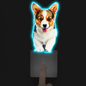 Detail of neon-effect corgi wall sticker showing light-up glow around a light switch