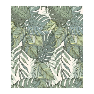 Detail of tropical monstera and palm leaf wall stickers with artistic hand-drawn patterns
