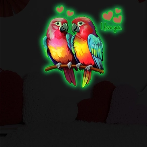 Glow-in-the-dark parrot wall sticker with glowing red hearts and I love you text