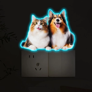Luminous neon cat and dog wall stickers glowing around a light switch in the dark