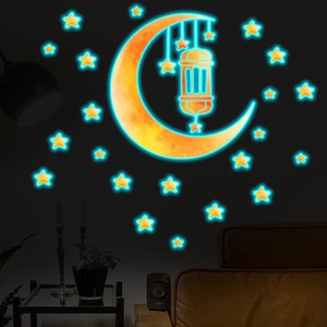 Luminous wall stickers featuring blue moon and stars for glowing home interior decoration
