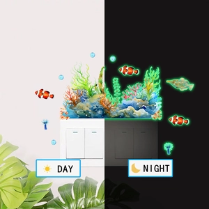 Luminous marine animal wall stickers showing day and night glow effect on light switch