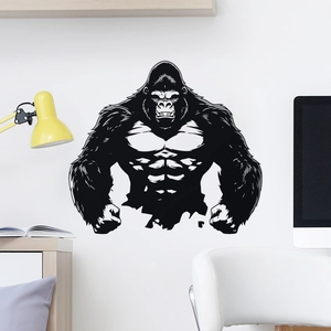 Detailed view of black gorilla wall decal applied on a clean white office wall surface