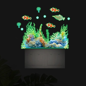 Luminous marine animal wall stickers showing glowing fish and coral on light switch