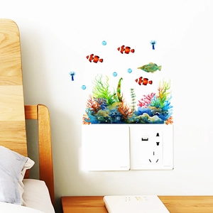 Glow in the dark ocean animal wall decals featuring colorful coral reefs and tropical fish