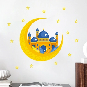 Adesivo murale rimovibile con luna e castello blu su una superficie bianca