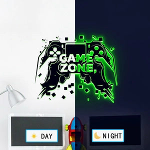 Luminous game controller wall sticker showing day and night glowing green effect
