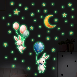 Luminous wall stickers set showing cute rabbit with green glow balloons and moon in the dark