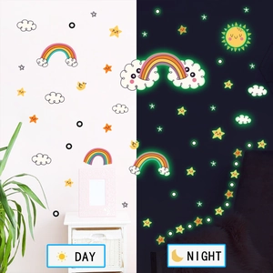 Luminous rainbow wall stickers showing daylight view and glowing green effect at night