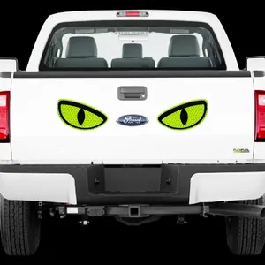 Fluorescent green luminous vinyl car stickers featuring sharp feline eyes with honeycomb texture