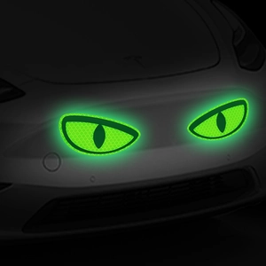 Glow-in-the-dark green eye decals with honeycomb texture for vehicle safety and decoration