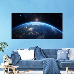 Luminous space earth wall sticker showing glowing city lights from space on a blue wall