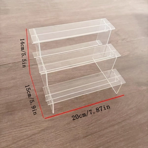 Three-tier clear acrylic display stand showing 20x15x14cm dimensions for figures