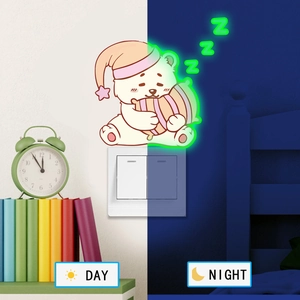 Luminous sleeping bear wall sticker showing bright green glow in the dark at night