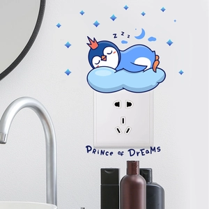 Glow-in-the-dark sleeping penguin wall sticker with crown and moon for room decor