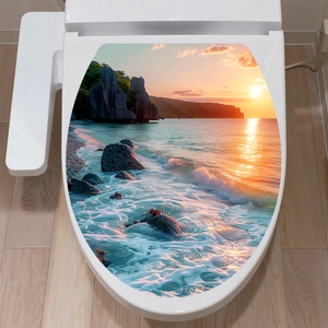 Waterproof ocean sunset landscape decal applied on a modern white toilet lid cover