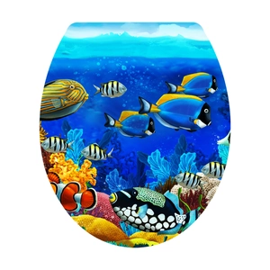 Self-adhesive toilet lid sticker featuring tropical coral reef and colorful clownfish