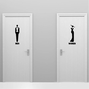 Creative toilet door signs with male and female silhouettes on white bathroom doors