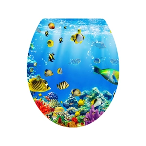 Detail of vibrant tropical fish and coral reef print on a universal toilet lid cover