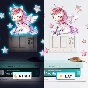Glow in the dark unicorn and stars wall stickers showing day and night lighting effects