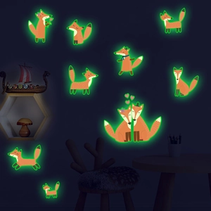 Glow-in-the-dark fox wall stickers for home decoration featuring luminous orange foxes
