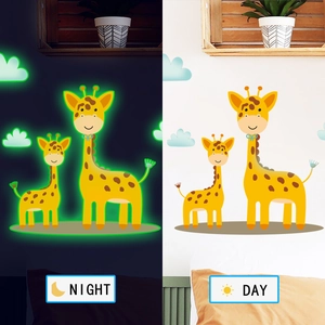 Luminous cartoon deer wall stickers showing day and night glow effect in living room