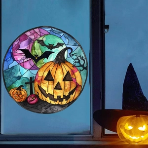 Stained glass Halloween window sticker featuring a glowing pumpkin, bats and full moon