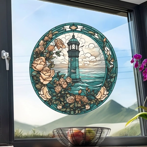 Detail of a round stained glass window film featuring a coastal lighthouse and roses
