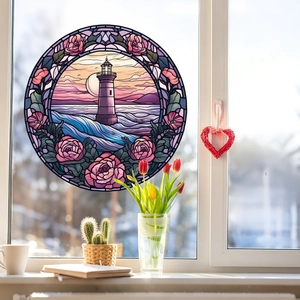 Detailed close-up of a circular lighthouse window cling with floral rose frame