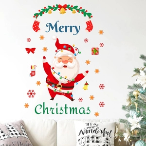 Weihnachtsmann Wandtattoo Set mit Schneeflocken und Merry Christmas Schriftzug für Wohnzimmer