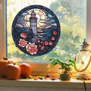 Close-up of lighthouse stained glass window decal in a cozy autumn home setting