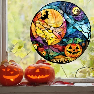 Vista dettagliata dell'adesivo per finestre Halloween con zucche e luna piena su vetro