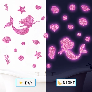 Pink glitter ocean wall stickers showing day and night glowing effect for kids room